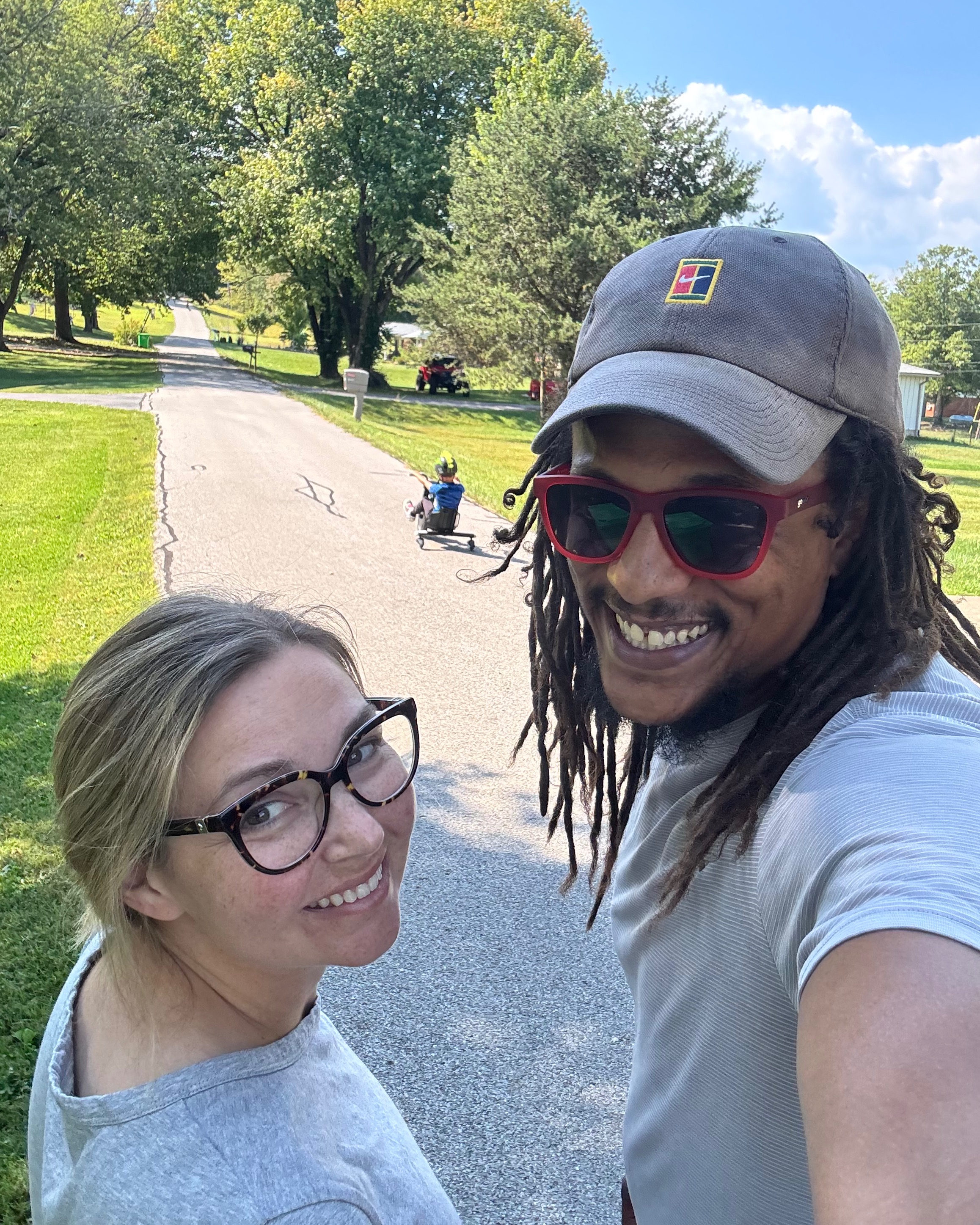 Kristina and Quentin outside at home